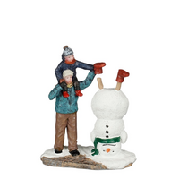 Making funny snowman l7.5b4h9cm